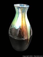 Front view of Rossa Cashel vase showing colorful glaze drip over black base.