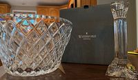 Photo showing Waterford Crystal bowl next to the original Waterford Crystal box and a candle holder.