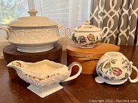 Photo showing all three items: Mason's white embossed covered casserole, Booth's Corinthian sugar bowl and creamer with floral patterns