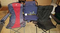 Three folding outdoor chairs: navy blue/red lounge chair, blue bleacher back chair, black lounge chair