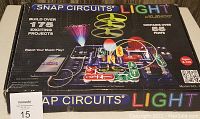 Box of Snap Circuits Light kit showing branding, model, and project count