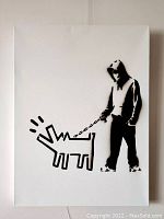Front view of the stencil painting showing black silhouette of person in hoodie with a dog on a leash, white canvas background.