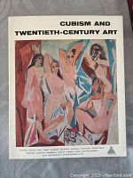 Cover photo showing the hardcover book titled 'Cubism and Twentieth-Century Art' featuring a colorful Cubist painting on the cover.