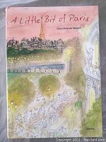 Front cover of the book 'A Little Bit of Paris' by Jean-Jacques Sempé, showing Parisian street scene and Eiffel Tower.
