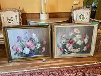Two signed still life paintings by B. Robertson in wood frames, displayed side by side showing overall condition and frame style.