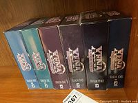 Six Xena Warrior Princess DVD boxed sets for Seasons 1 through 6 shown horizontally on a shelf.