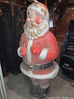 Full view of vintage blow mold Santa Claus figurine standing, showing overall design and condition