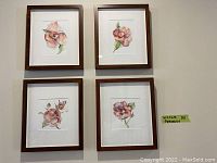 Four framed floral watercolor prints by Michele Miller, arranged on a wall showing the overall set.