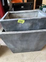 Set of two large rectangular garden planters stacked, showing dark gray material and rectangular shape.