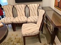 Front view of all four chairs grouped