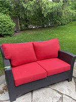 Front right three-quarter view showing frame texture and cushion placement