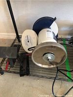 Front view of grinder showing two wheels and tool rests