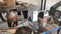Photo showing Sears Craftsman multi-purpose router on shelf with power cord and router guide box beneath