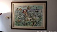 Framed original watercolor art showing humorous fisherman caricature with fish body and ocean scene, viewed straight on the wall.