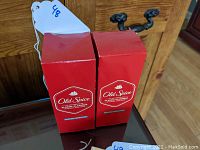 Two sealed boxed bottles of Old Spice Classic After Shave, showing brand and vintage styling on the front.