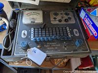 Full view of the Superior Instruments Model 85 Dynamic Tube Tester showing control panel, meter, rotary knobs, and tube sockets.