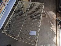Welded wire metal table rack overall view showing top grid structure and frame