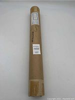 Full view of sealed cardboard shipping tube containing 1991 baseball cards