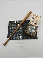 Full lot overview showing miniature bat, coin folder with MLB coins, and King Edward smoker's box with bagged coins.