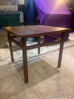 Full image of the teak mid-century modern square end table showing overall shape, legs and top