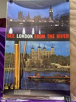 Poster showing nighttime view of London with Houses of Parliament, Big Ben, Tower of London and boats on the river, with 'SEE LONDON FROM THE RIVER' text