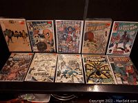 Full display of all 10 comics showing various titles and covers including Spider-Man and Time Master.
