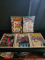 Image of five Marvel Age comics laid out in two rows, showing front covers with various characters and titles.