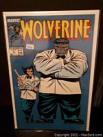 Front cover of Marvel Wolverine comic book issue 8 featuring Wolverine and Hulk in tuxedos.
