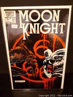 Full cover photo of Moon Knight comic #30 featuring Moon Knight fighting a werewolf on a black and red occult symbol background.