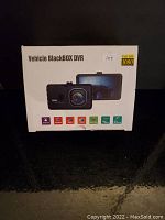 Front of the retail box showing the Xgody Vehicle BlackBOX DVR camera and screen display, with feature icons and Full HD 1080 marking.