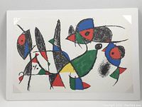Full view of the Joan Miro lithograph showing abstract colorful design with birds and geometric shapes.