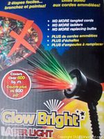 Product box showing Glow Bright logo, laser light image projecting multicolor red and green light beams, covering 600 sq. ft.