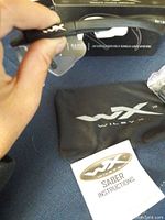 Close-up of Wiley X Saber eyewear frame side showing logo and part of the frame