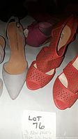 Three pairs of women's size 6.5 high heel shoes showing light grey closed-toe, red perforated peep-toe, and pink shiny peep-toe styles