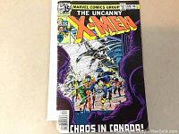 Front cover of Uncanny X-Men #120 comic book showing title, artwork, characters and condition with chunk missing on bottom left.