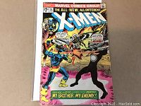 Front cover of the Uncanny X-Men #97 comic book showing action scene with Cyclops and other characters.