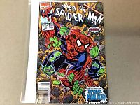 Front cover of Web of Spider-Man #70 comic book showing Spider-Hulk fighting Spider-Man with the title prominently displayed.