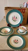 Assortment of Homer Laughlin Empire Green pieces displayed on table