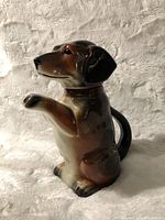 3/4 front view showing head, paw spout and body glaze