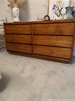 Front view of dresser showing six drawers and overall design