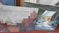 Image of cityscape painting showing buildings and rooftops with muted sky, signed Jane Mayo