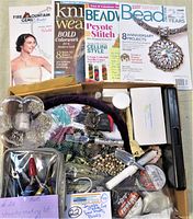 Overview photo showing assorted beads, tools, electronic caliper in case, magazines, and other jewelry supplies in a box.