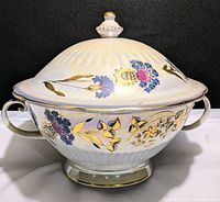 Front view of the 12-inch porcelain soup tureen showing blue floral and gold leaf pattern with two handles and lid finial.
