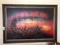 Front view of wood framed oil painting depicting abstract figures in a semi-circular group against a sunset