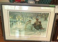 Full view of framed and matted signed Trisha Romance print showing a winter scene with figures and village in background.