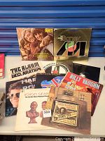Photo showing a group of vinyl records including The Monkees, The Magic of Boney M, Billy Vaughn Sail Along Silv, The Alarm Declaration, Echoes of Fantasy, Long John Baldry and others.