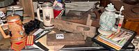 Overview of lot showing two ceramic steins, wooden block planes, assorted papers and pencil case