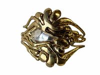 Close-up image of the Brutalist Modernist cuff bracelet showing the detailed multi-metal sculptural design from the front angle.