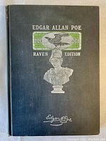 Front cover of 1904 Edgar Allan Poe Raven Edition book with decorative bust and raven illustration