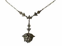 Close-up of the necklace showing the marcasite stones and floral leaf design